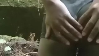 Horny bottom fingering asshole outdoors