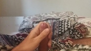 Man masturbating while moaning until he cums