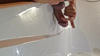 Man experiments in the bath, squirts during prostate massage, pees right on camera and cums