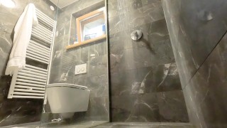 Enjoy anal play in the shower