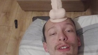 Skinny skinhead gives his dildo a sloppy blowjob and enjoys slapping dildo all around himself