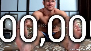 Stand up Dev tries to resist the tickles while bondaged