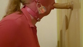 Sissy sucks on a dildo