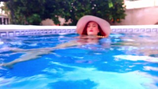 Ariel Ortiz under the water of her pool, masturbates in front of her stepfather to make him horny