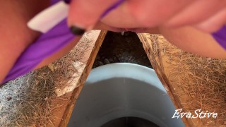 I peed in the outdoor toilet and filmed it on my phone
