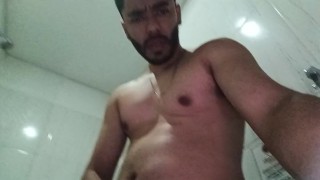 Masturbating playing with my foreskin while peeing in the bathroom