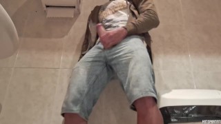 Exhibitionist guy touches his cock outdoor - girl gives him a handjob after leaving the bathroom