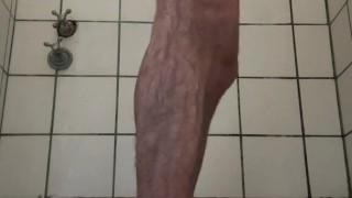 Hung guy wanking in military barracks showers - Amateur video