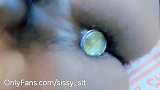 Pissing while in chastity cage and butt plug