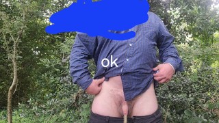 Fat guy pissing outdoors