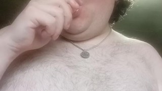 Sean enjoyin a hot dog