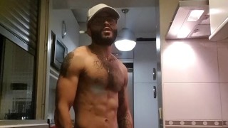 Muscular man has romantic sex in the kitchen