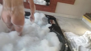 brunette washes her big tits in hydromassage