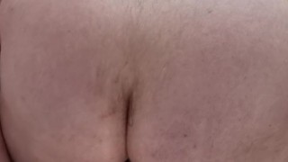 white kiwi bear from NZ puts a cucumber in his ass.