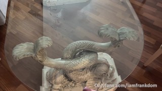 Big dick shots a lot of cum all over a glass table