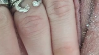 Rubbing stretching pulsing pink pussy in bath close up