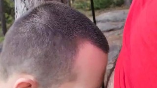 Hairy boys blowing a load together on a mountain top.