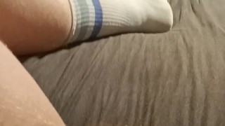 twink jerks off into a sweaty sock after a long day of work