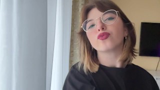 Attractive brunette in a t-shirt shows off her beautiful tits