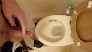 Pissing from my hung cut cock with my balls out