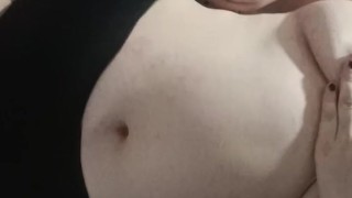 An aroused woman in a caress.