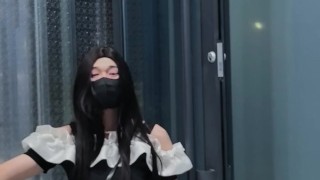 Chinese ladyboy in black tight skirt cums at the door of public toilet