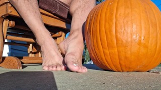 Showing off my pedicured feet next to my pumpkin