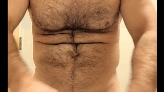 HAIRY MUSCLE BEAR FLEXING, STROKING COCK AND PLAYING WITH NIPPLES