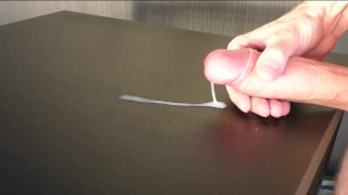 Guy with pubic hair cums on table