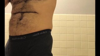 HAIRY MUSCLE BEAR STRIPPING TO BOXER BRIEFS AND FLEXING