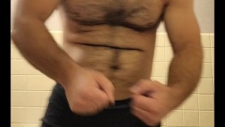 HAIRY MUSCLE BEAR STRIPPING TO BOXER BRIEFS AND FLEXING