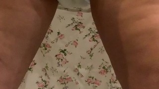 Up skirt view of girl pissing in diaper