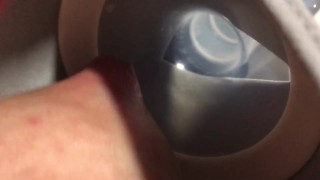 Milking milk with a breast pump to the last drop - close-up - Lactation - Milky tits