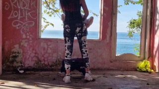 Anal strapon sex with a slave in an abandoned building by the sea