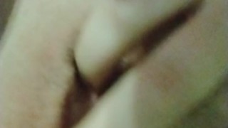 Slut Plays With Her Pink Pussy With A Tail Plug In