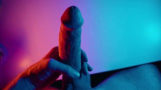 Stroking my Big White Cock under colored lighting 😈