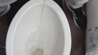 Taking a giant piss after a long workout.