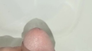 Submissive  urinating, big, venomous cock, close-up