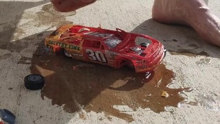 Smashing a NASCAR model toy car with my sticky and dirty big giantess feet