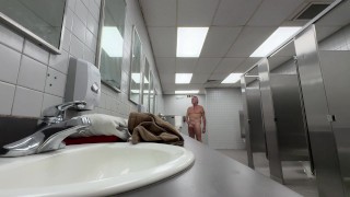 Changing clothes and jacking off in public restroom. Almost caught!