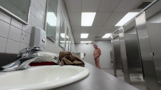 Changing clothes and jacking off in public restroom. Almost caught!