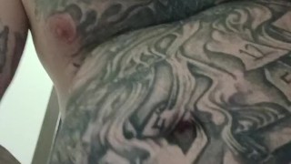 Tattooed up white guy jacking off.