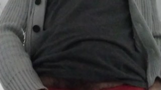 Bulging in red lace underwear while doing laundry