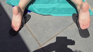Sunbathing on balcony (feet soles angle only)