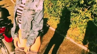 PUBLIC WALKING OUTSIDE NAKED BATH BRIDGE PARK BIKE