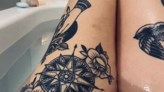 tattooed alt girl plays with her pussy in the bath