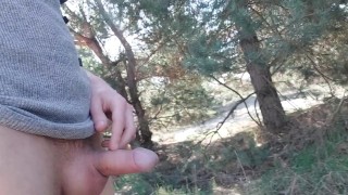 Young twink gets seen by a curious man while publicly jerking off at a nude beach!