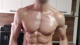 6'7" oiled muscular stud flexing and stroking his BWC