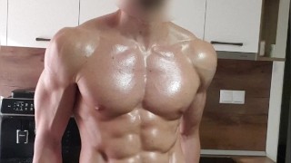 6'7" oiled muscular stud flexing and stroking his BWC