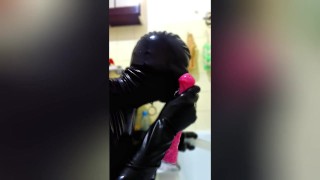 Latex Sissy In Chastity Throat Training